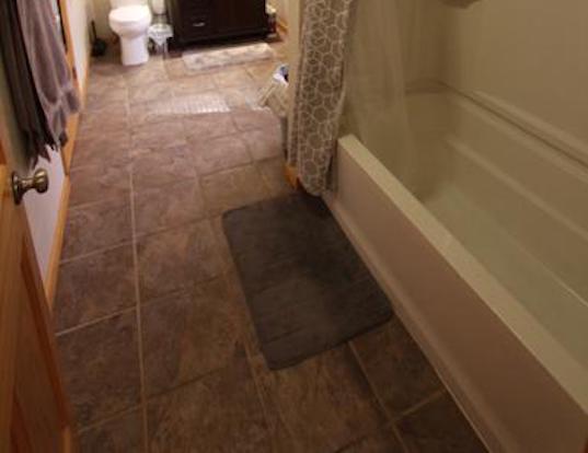 Bathroom with tub and toilet