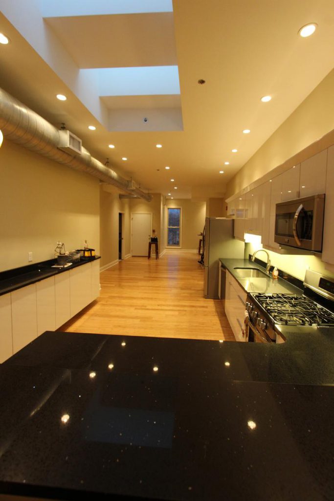 Modern kitchen with wooden floor