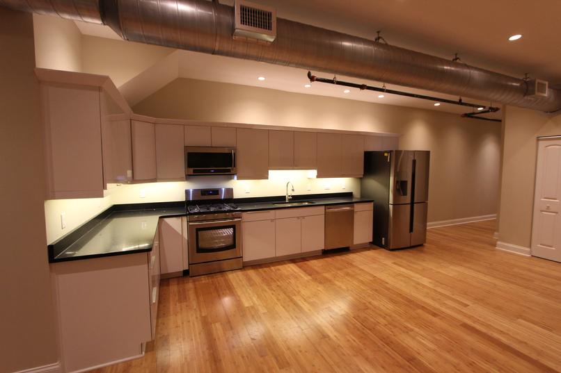 Modern kitchen with wood floor