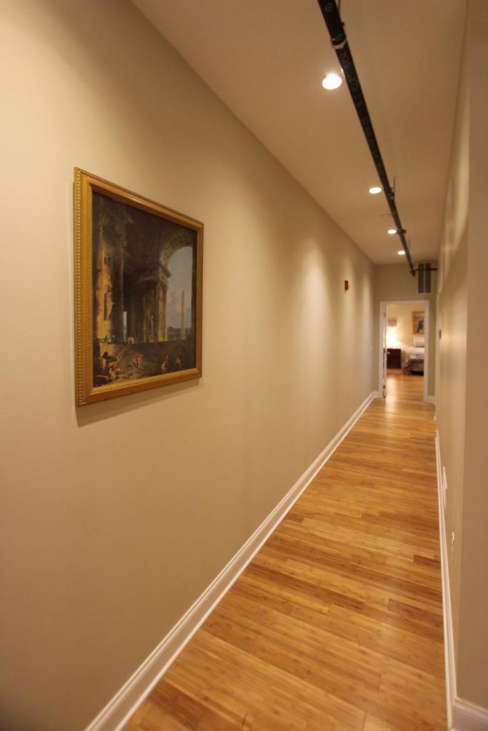 Hallway with framed painting