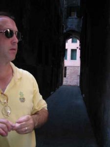 Man in narrow alleyway